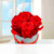 4 rote haltbare Rosen in Hutschachtel
