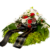 Trauerkranz mit roten Rosen und weißen Lilien